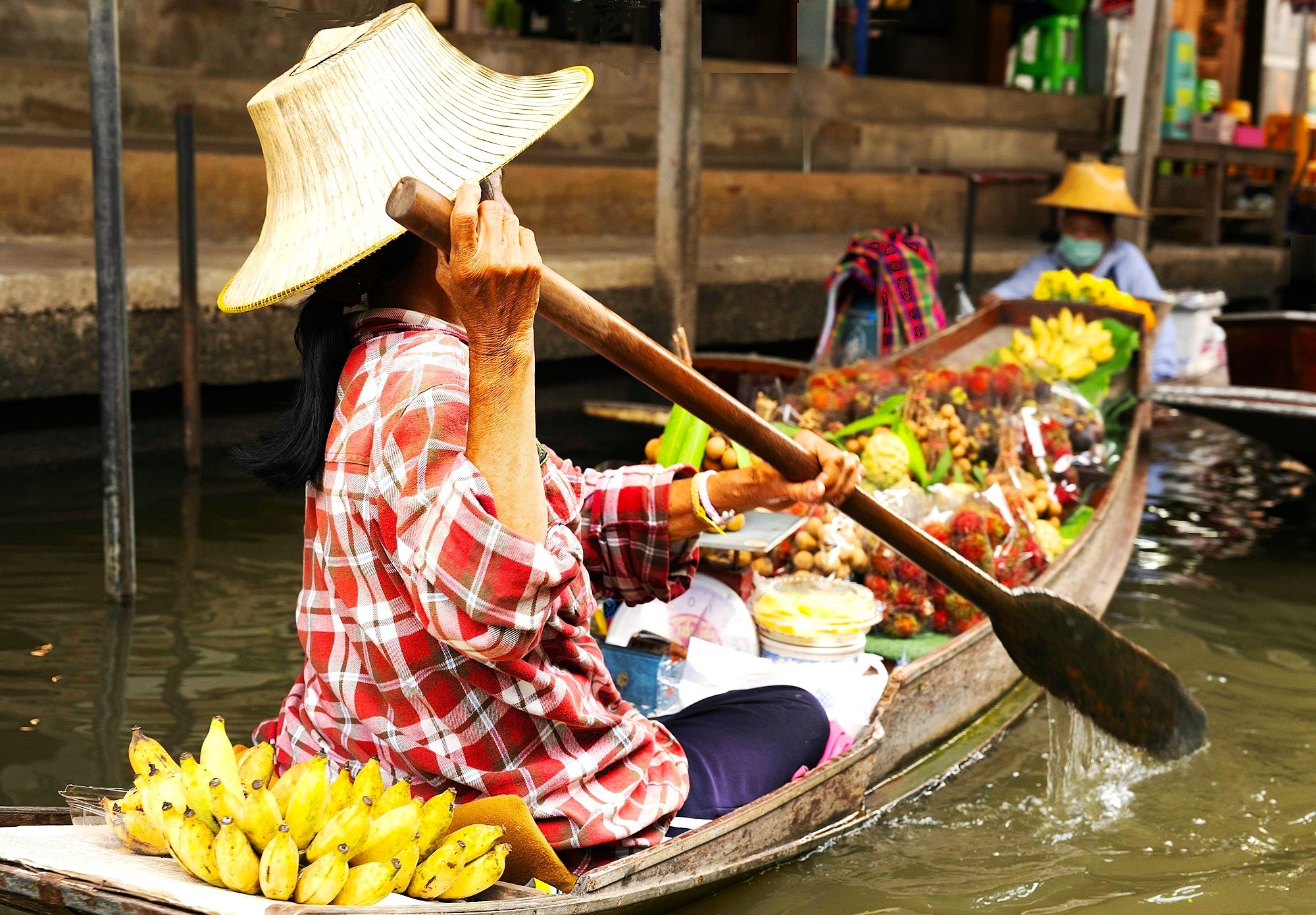 verkoopster op de markt in Bangkok